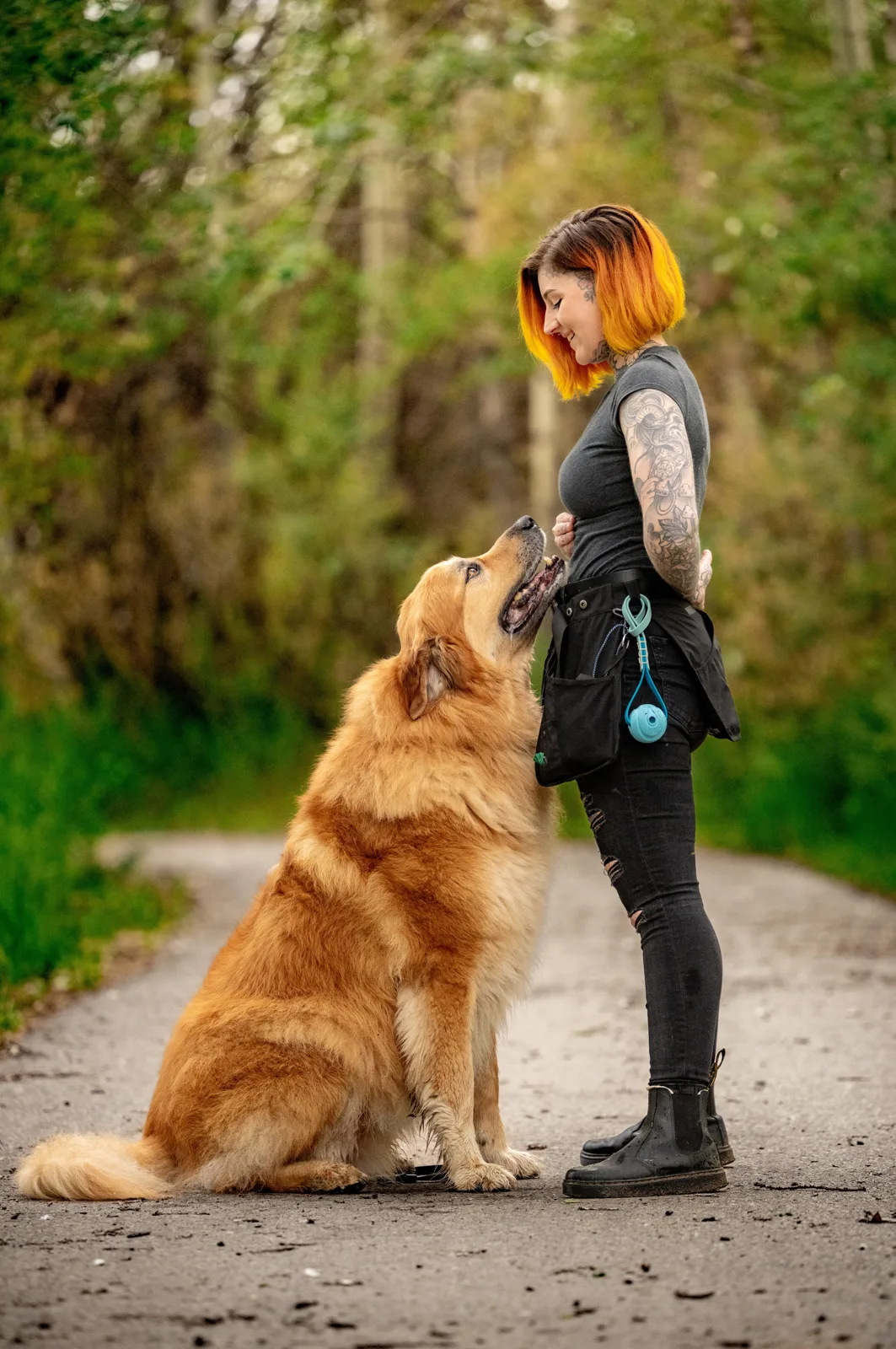 Dominique sharing a quiet moment with a dog